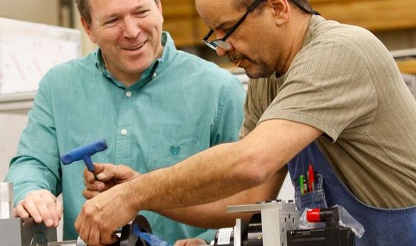 ADS engineers collaborating on an automation project